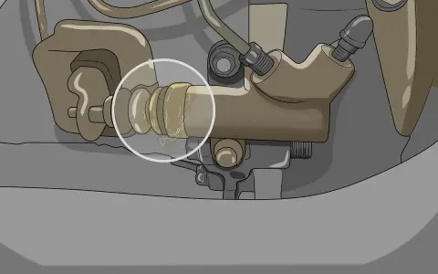 Le liquide d'embrayage suinte d'un soufflet usé sur le cylindre récepteur.